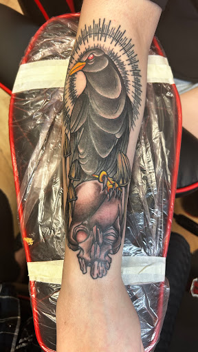 Explore adventurer tattoo ideas, creative tattoo ideas in Cedar Falls, available at Tales Untold Tattoos
