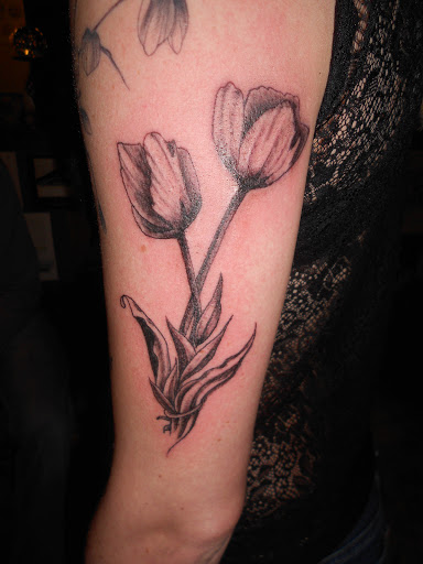 Explore healer tattoo ideas, creative tattoo ideas in Dayton, available at East Dayton Tattoo Studio