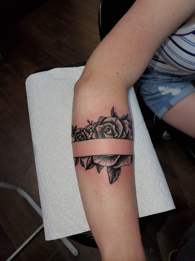 Explore black and grey sleeve tattoo ideas, creative tattoo ideas in Lubbock, available at Sinners & Saints Art Company