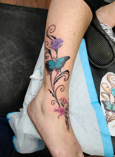 Explore religious tattoo ideas for women, creative tattoo ideas in Hawthorne, available at Artistic Vision Ink Tattoo And Body Piercing