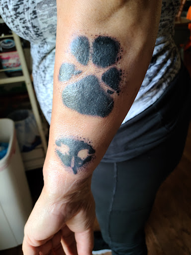 Explore female chest tattoo ideas, creative tattoo ideas in Springfield, available at The Tattoo Shop