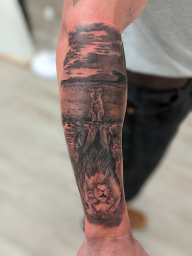 Explore military dog tag tattoo ideas, creative tattoo ideas in Monroe, available at The Chapel