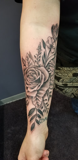 Explore meaningful family tattoo ideas, creative tattoo ideas in Bryan, available at Testament Tattoo