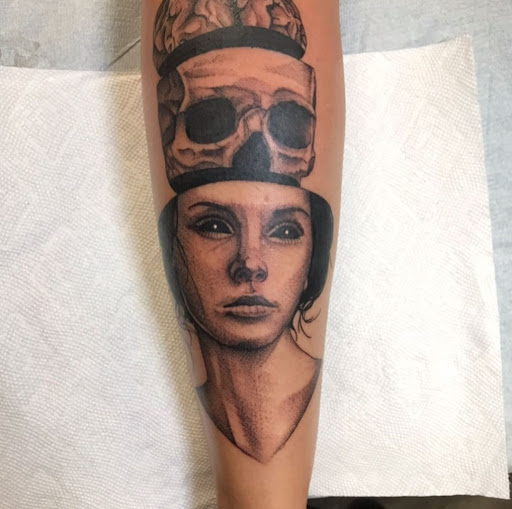 Explore ferret tattoo ideas, creative tattoo ideas in Abington, available at Tattoo Galaxy (Abington) Piercing and Custom Tattoos