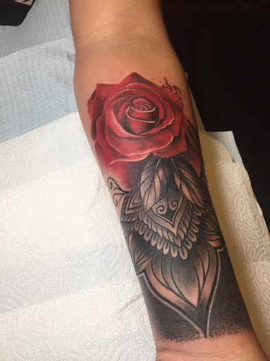 Explore hand tattoos for men ideas, creative tattoo ideas in Atlanta, available at Camp Creek Body Art & Laser