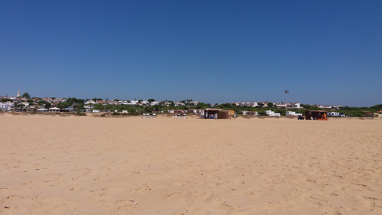 Photo of Mazagon Beach and the settlement