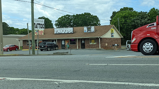 Explore catholic tattoo ideas, creative tattoo ideas in Calhoun, available at A Sailors Grave Tattoo Parlor