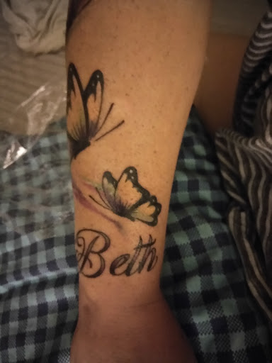 Explore niece tattoo ideas, creative tattoo ideas in Jacksonville, available at Fat Kat Tattoo & Body Piercing