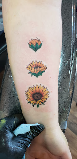 Explore tragus tattoo ideas, creative tattoo ideas in Cornelia, available at Prismatic Pulse Tattoo