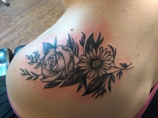 Explore biblical tattoo ideas for guys, creative tattoo ideas in Akron, available at Assassin Tattoo Studio