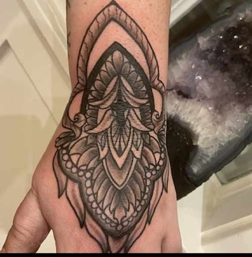 Explore dog tag tattoo ideas, creative tattoo ideas in The Dalles, available at Tattooing by Denver Monaghan