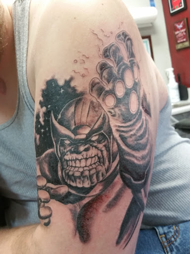 Explore snowboarding tattoo ideas, creative tattoo ideas in Indianapolis, available at Artistic Skin Design and Body Piercing