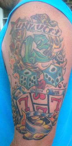 Explore dedication tattoo ideas, creative tattoo ideas in Anderson, available at FearlessTattoos and Piercing