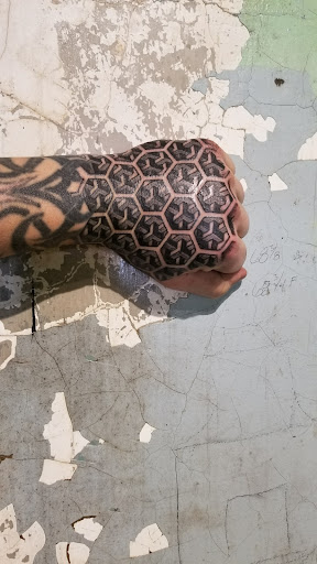 Explore nautical sleeve tattoo ideas, creative tattoo ideas in Detroit, available at Iconic Tattoo & Body Piercing