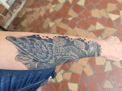 Explore rockabilly tattoo ideas, creative tattoo ideas in Augusta, available at Tailored Ink Tattoo Studio