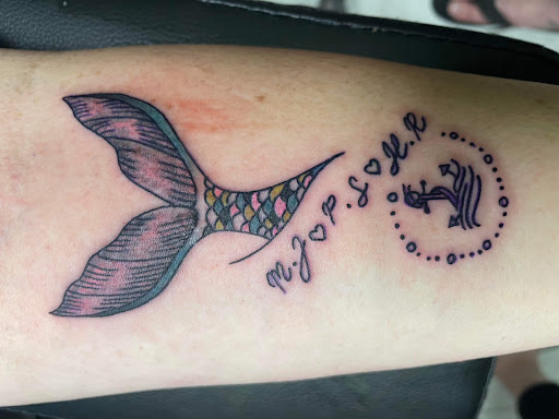 Find crown tattoo ideas for females for your next unique tattoo in Foley at Symbolic Ink Tattoo Studio