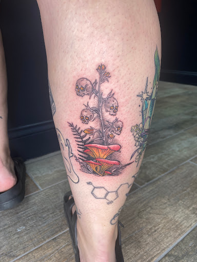 Explore back neck tattoo ideas, creative tattoo ideas in Buford, available at Wild Tribe Tattoos and Piercings
