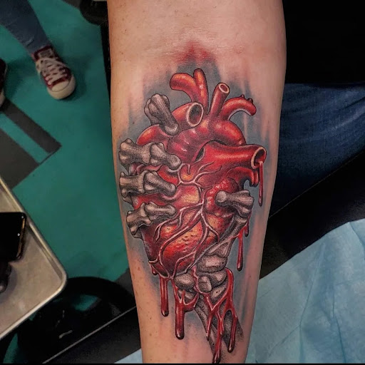 Explore st christopher tattoo ideas, creative tattoo ideas in Houston, available at Los Muertos Tattoo Studio and Art Gallery