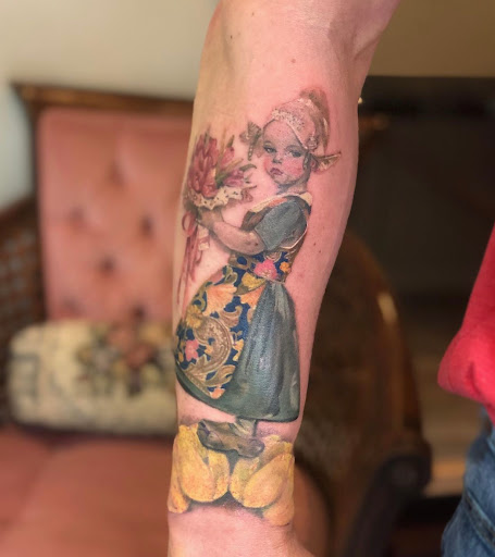 Explore fullback tattoo ideas, creative tattoo ideas in Jackson, available at 21 Blooms tattoo studio