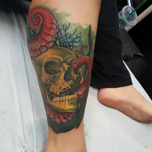 Explore womb tattoo ideas, creative tattoo ideas in Pittsburg, available at Delta Art & Tattoo