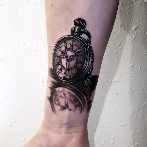 Find arm band tattoo ideas for your next unique tattoo in Sparta at Black Sheep Studios