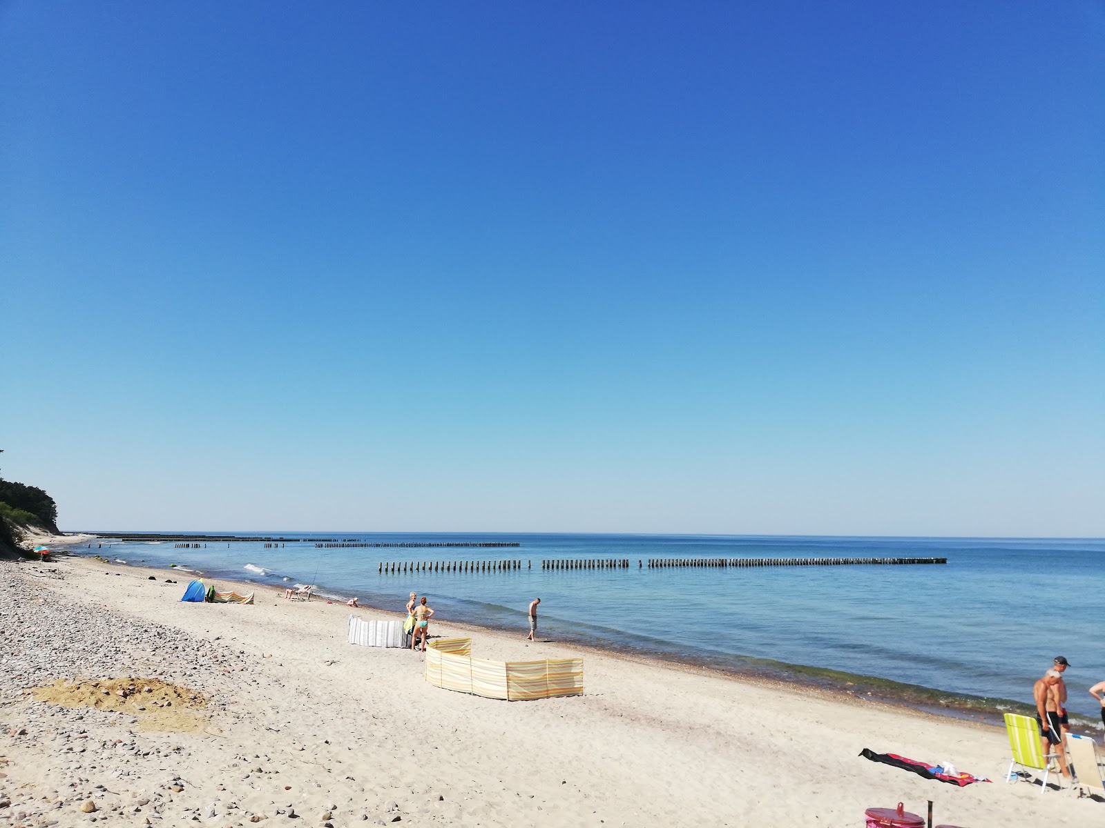 Foto van Wicie Plaża met recht en lang