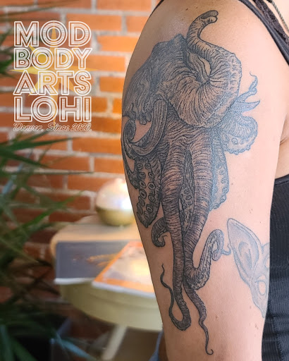 Explore flower wrist tattoo ideas, creative tattoo ideas in Denver, available at Mod Body Arts