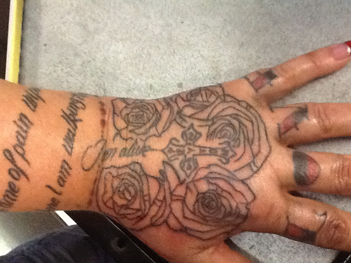 Find tattoo ideas of roses for your next unique tattoo in Tucson at Sacred Art Tattoo Studio