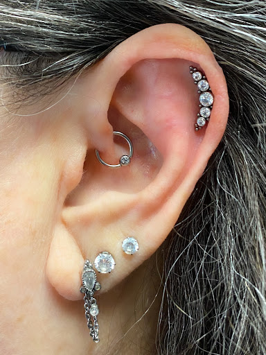 Explore pisces tattoo ideas men, creative tattoo ideas in Springfield, available at Body Piercing By Qui Qui