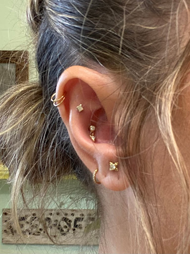 Explore viking tattoo ideas for woman, creative tattoo ideas in Toledo, available at Piercings by Caitlin presents Holier Toledo