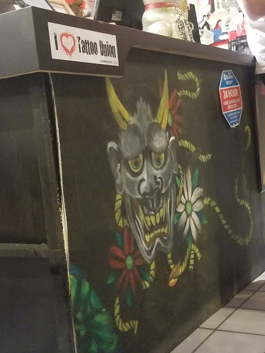 Explore negative space tattoo ideas, creative tattoo ideas in Chicago, available at TATTOO UNION CHICAGO