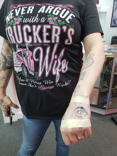 Explore bird family tattoo ideas, creative tattoo ideas in Grand Rapids, available at Screaming Needle Tattoo & Body Piercing Studios