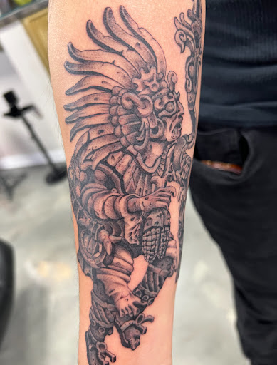 Find ouija board tattoo ideas for your next unique tattoo in Lake Bluff at Evolution Body Arts