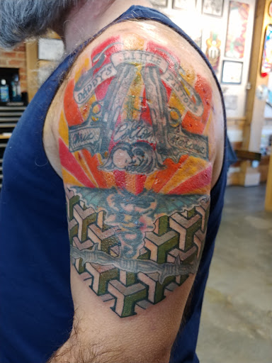 Explore leg cover up tattoo ideas, creative tattoo ideas in Dunn, available at Heart and Hammer Tattoo Co.