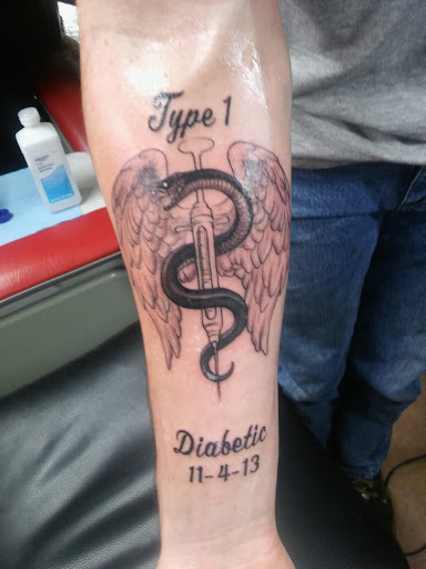 Explore 1997 tattoo ideas, creative tattoo ideas in Coeur D Alene, available at Jojos Tattoo & Body Piercing