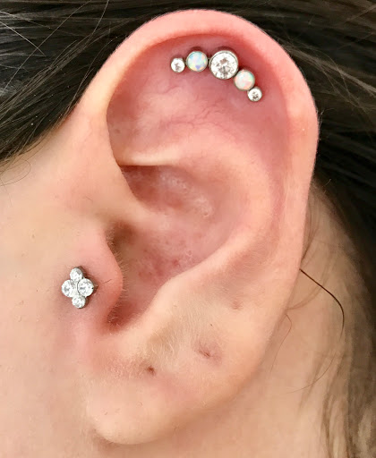 Explore black tattoo cover up ideas, creative tattoo ideas in Huntington Beach, available at Tommy Ts Body Piercing