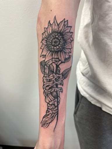 Explore charm tattoo ideas, creative tattoo ideas in Seymour, available at American Gypsy Tattoo Corp.