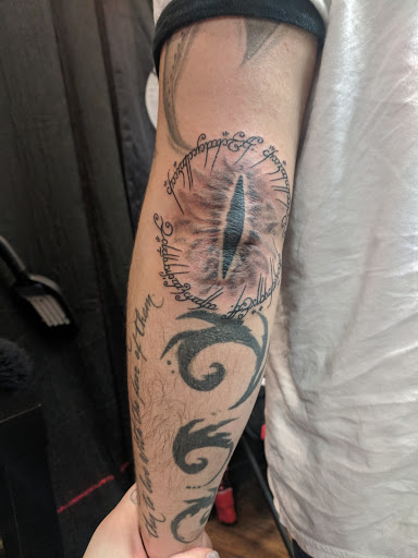 Explore inner bicep tattoo cover up ideas, creative tattoo ideas in Toledo, available at Brass Monkey Tattoo Co