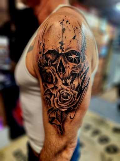 Explore 1975 tattoo ideas, creative tattoo ideas in Boonville, available at UYS Under Your Skin Tattoos and Piercings