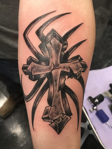 Explore thor's hammer tattoo ideas, creative tattoo ideas in Rogers, available at Jimmy Romance Tattoo & Body Piercing