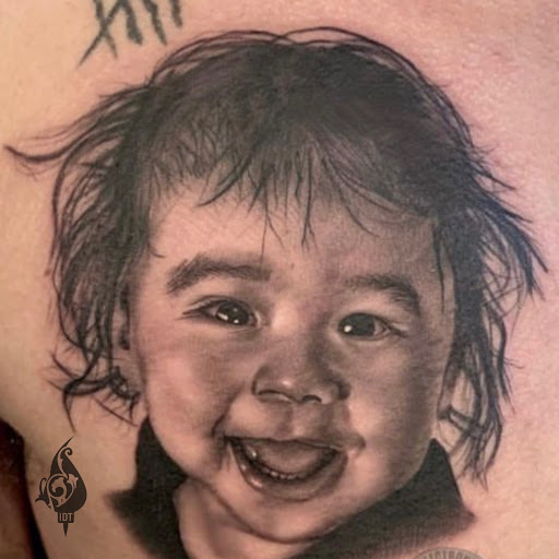 Explore saturn tattoo ideas, creative tattoo ideas in Long Beach, available at Inky Dreams Tattoo