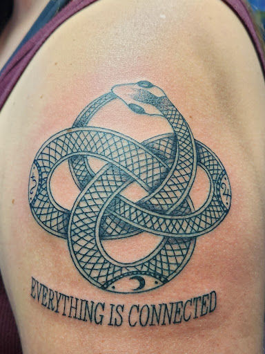 Explore female half sleeve tattoo ideas, creative tattoo ideas in Reno, available at Evolution Tattoo