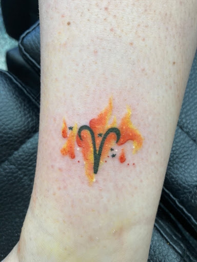 Explore blackout tattoo ideas, creative tattoo ideas in Slippery Rock, available at Dinky Dachshund Tattoo Parlor