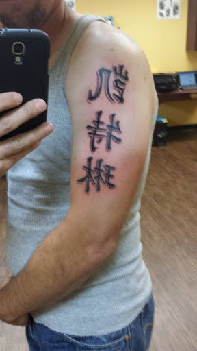 Tattoo Shop «Lizards Ink Tattoo Studio Denton», reviews and photos, 1111 E McKinney St, Denton, TX 76209, USA