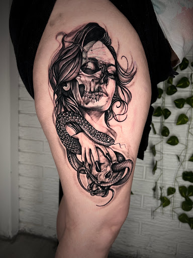Explore knee scar tattoo ideas, creative tattoo ideas in San Antonio, available at Ink & Iron Tattoos & Piercings