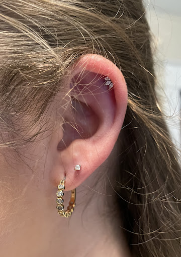 Explore batman tattoo ideas, creative tattoo ideas in Buffalo, available at Moria Piercing and Jewelry