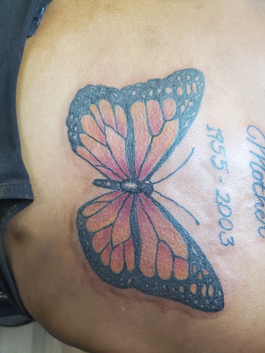 Explore tattoo ideas for back, creative tattoo ideas in Williamston, available at Lucky Tiger Tattoo studio