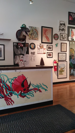 Tattoo Shop «Dinosaur Studio Tattoo & Art Gallery», reviews and photos, 116 S Genesee St, Waukegan, IL 60085, USA