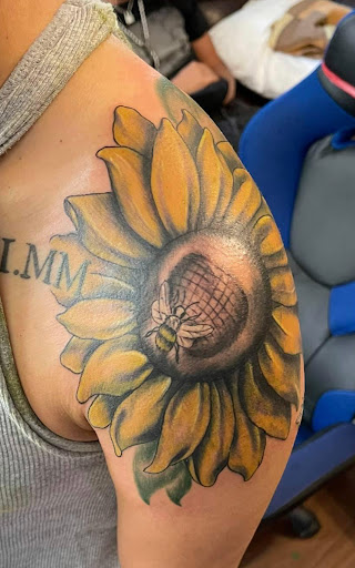 Explore funny small tattoo ideas, creative tattoo ideas in Mayodan, available at Bleeding Ink Tattoo