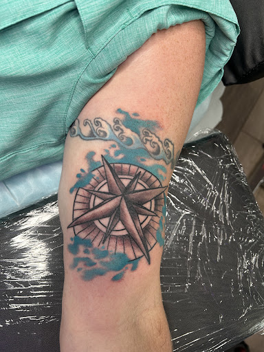 Find addams family tattoo ideas for your next unique tattoo in Holly Ridge at Evolution Tattoo Studio